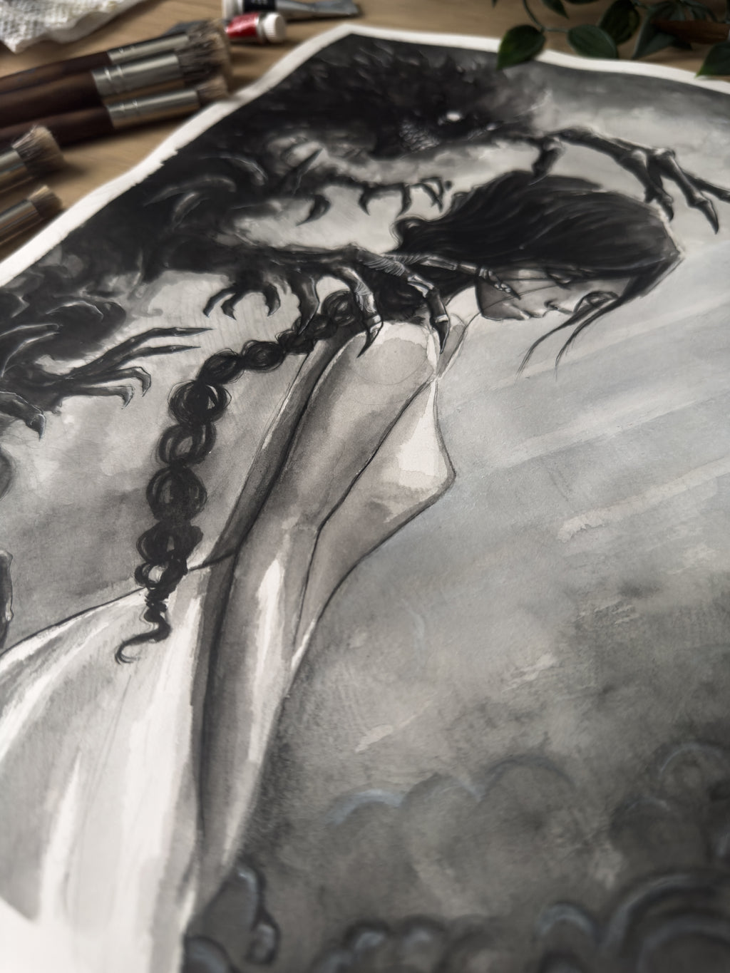 Death spirit grasping at a woman painted with watercolor in a Japanese inspired style in black and white close up at an angle
