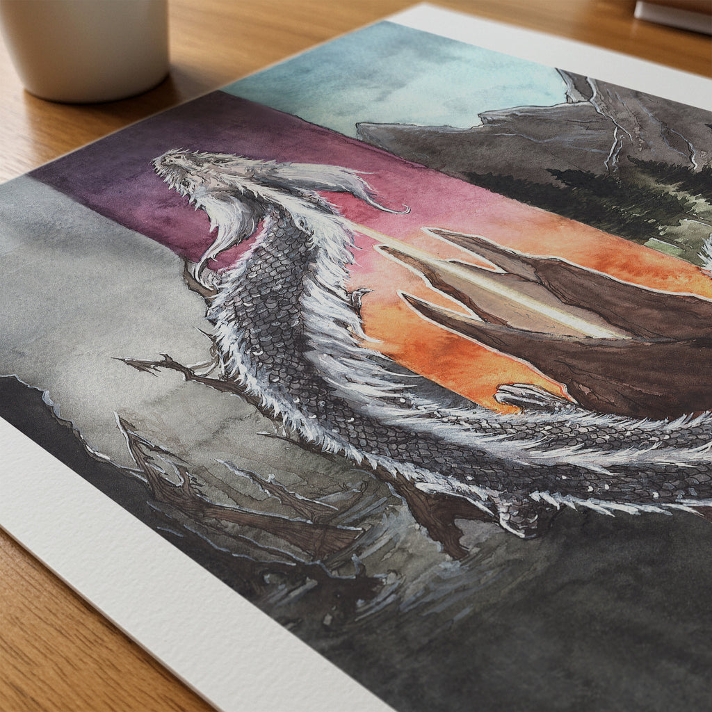 falkor dragon watercolor painting print laying flat close up on a desktop