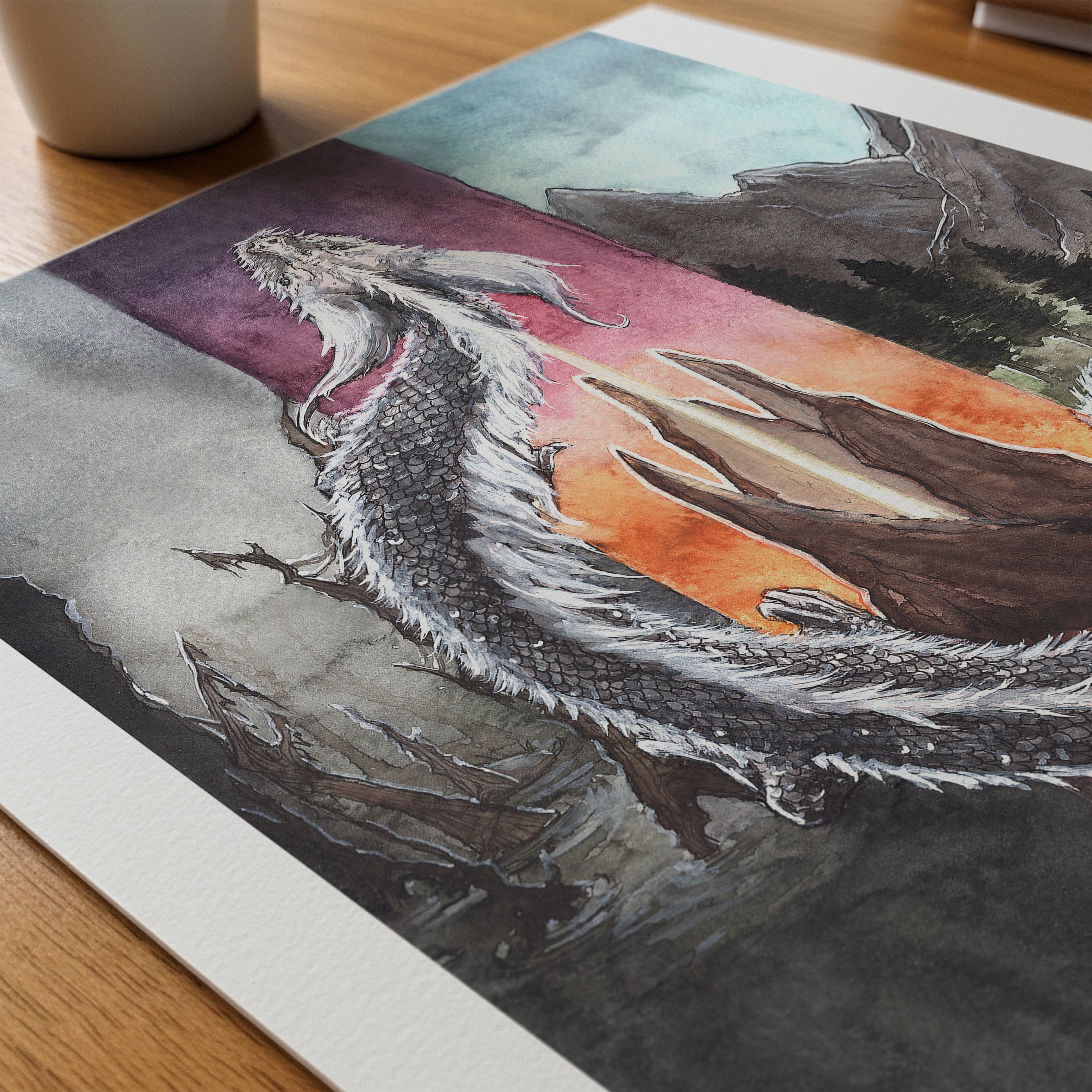 falkor dragon watercolor painting print laying flat close up on a desktop